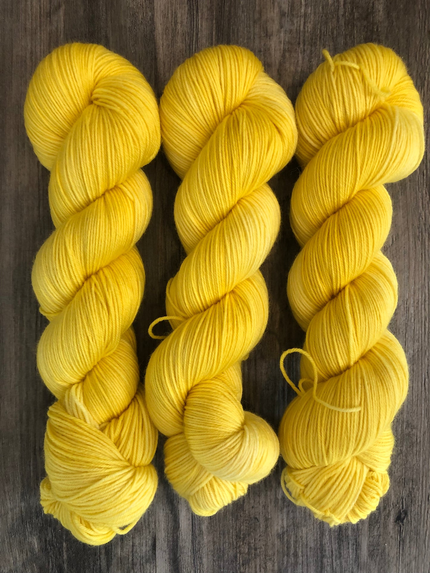 Spring Yellow - Tonal, Semi Solid - Shown in DK and Fingering weight. Available on other bases.  See description for details.