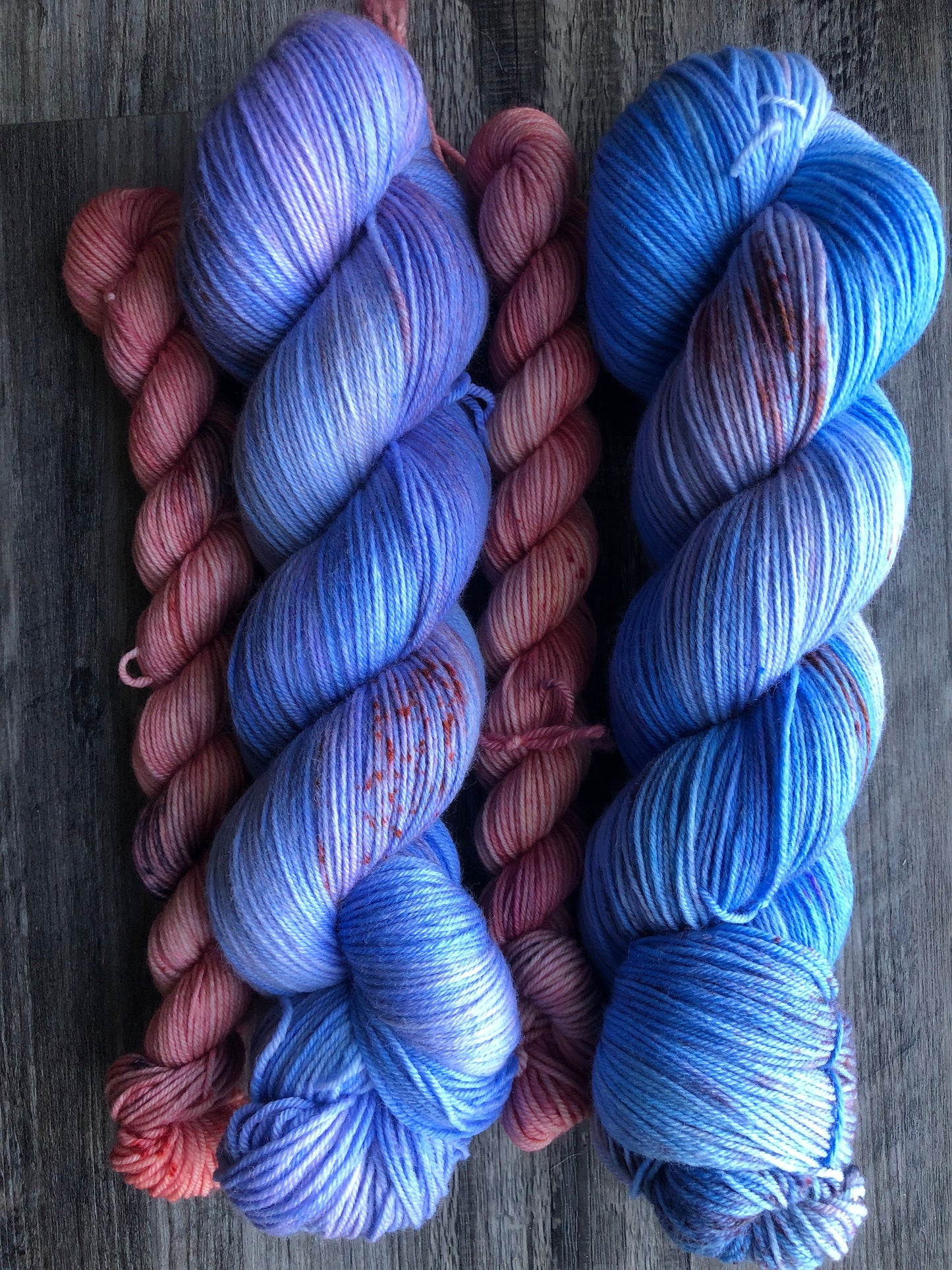 Monthly Sock Set - Hand dyed yarn club subscription. Pictures of previous month sock sets are shown.