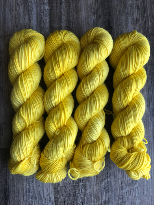 Spring Yellow - Tonal, Semi Solid - Shown in DK and Fingering weight. Available on other bases.  See description for details.